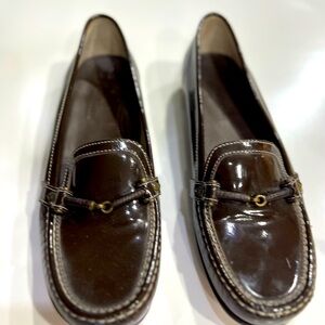 Brown patent leather Cole Haan loafers, size 9B.